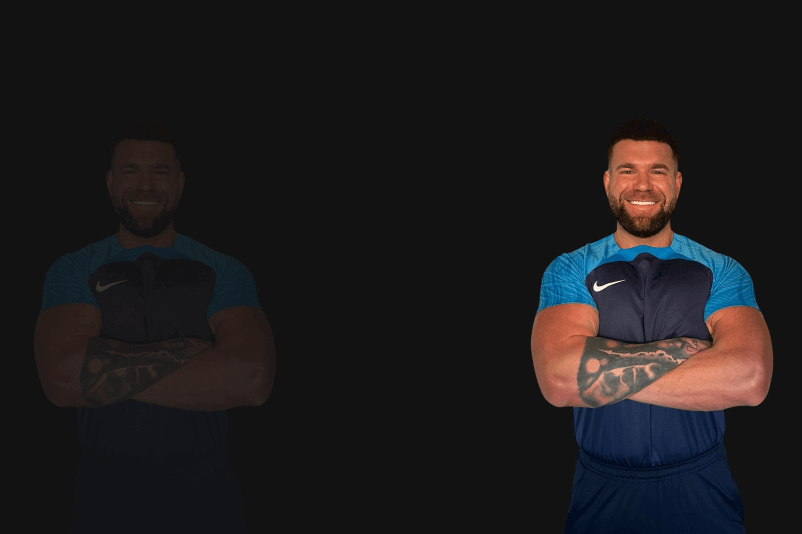 Joe Wilson smiling, wearing a blue training shirt